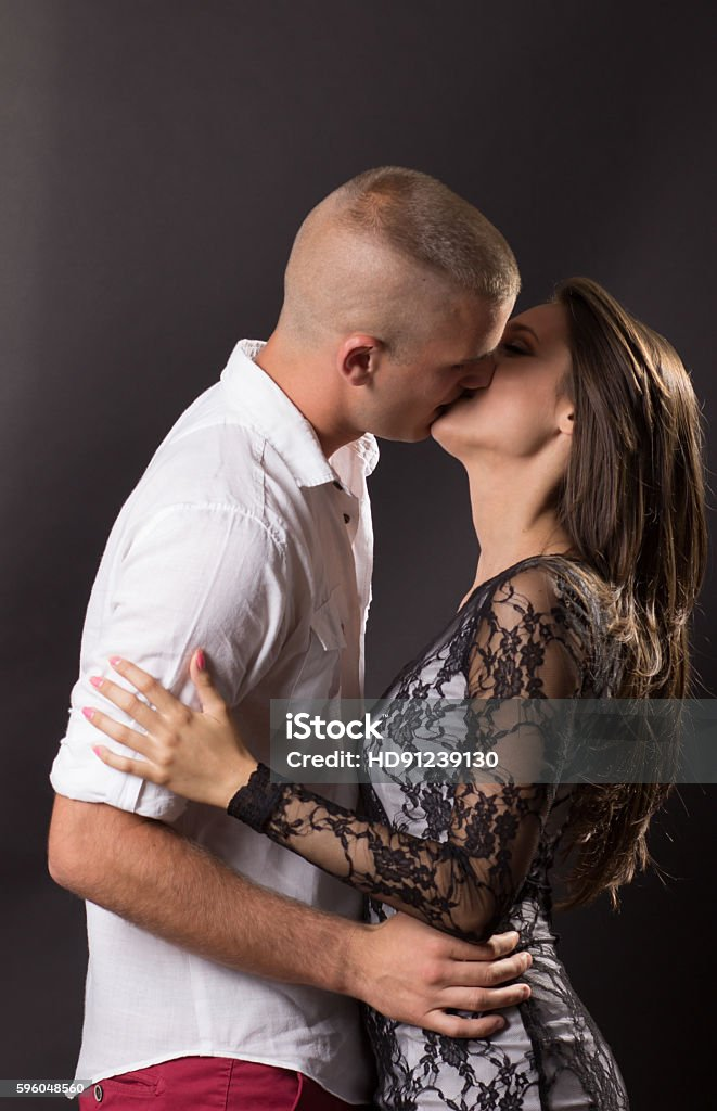 Couple embracing and kissing