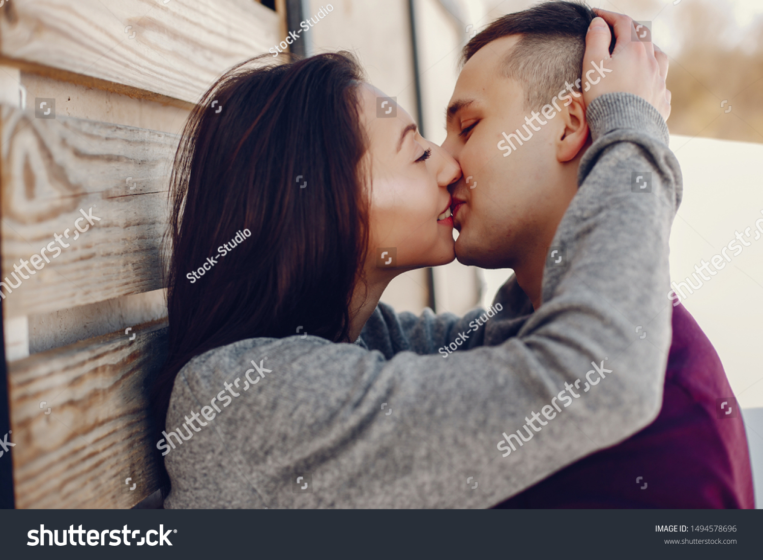 Couple kissing outdoors
