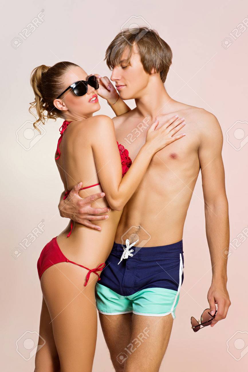 Confident couple hugging on vacation